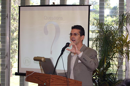 Dr. Lionel Orama, program coodinator, giving his speech to those present during the meeting.