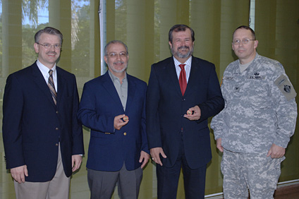 The director of Civil Engineering, professor Ismael Pagán Trinidad, second from the left; and UPRM chancellor Jorge Iván Vélez Arocho, third with David Pittman and Colonel Gary Johnston, commander of the Corps of Engineers, while receiving recognition for their work.