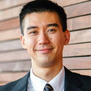 Stock photo of a young person in a business suit.