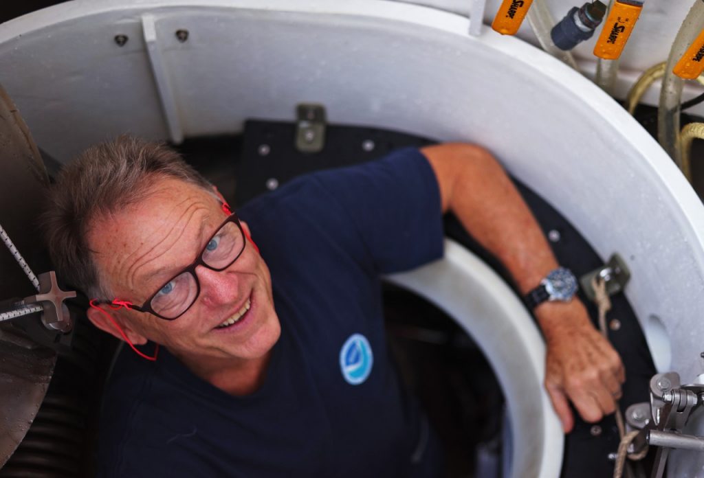 Photo of Professor Wilford Schmidt exiting the Alvin DSV-2 research submersible. 
