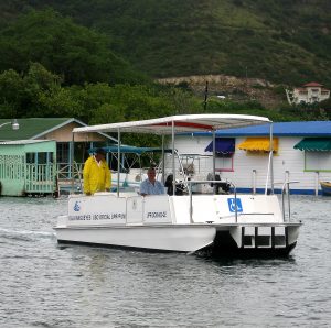 Photo of the Magueyes Island access boat. The 'Botero' boat takes people in and out of Isla Magueyes. 