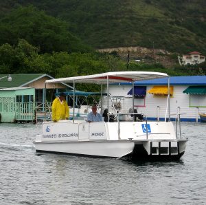 Photo of the Magueyes Island access boat. The 'Botero' boat takes people in and out of Isla Magueyes.