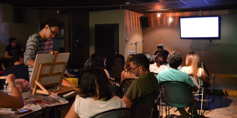 10731153_764365196936301_3424711633654859292_n A view of the audience and artists during the Open Mic Night. EDSA collaborated with TACU and La Cueva de Tarzan to host an ”Open Mic Night” as part of La Cueva de Tarzan’s 9th Anniversary Celebration.
