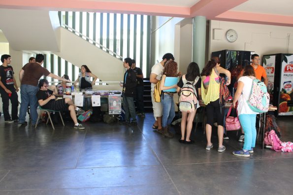 A panoramic shot of the Chardon Lobby during the EDSA Book & Bake Sale. Even though it is covered by people, both tables are present in this picture. The one for the bake sale and the one for the book sale.