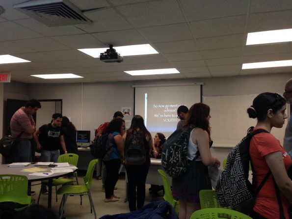 Students present at the department hosted annual Undergraduate Mixer where students get a chance to meet their advisors and find out the associations that they can join.
