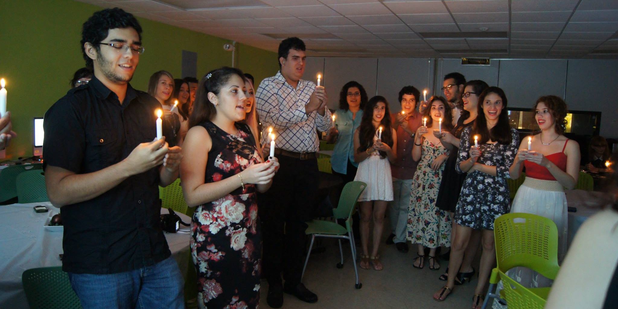 460046_785902401449247_8420474201073739140_o Students holding lit candles at the EDSA Fall Initiation of 2014.