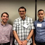 Three members posing for the camera at The Pop Culture Conference.