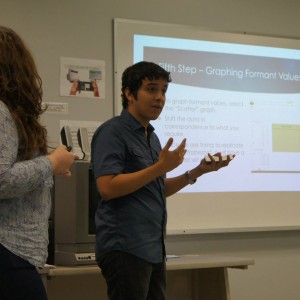 Students presenting material in front of the classroom at the Linguistics Colloquium 2015.