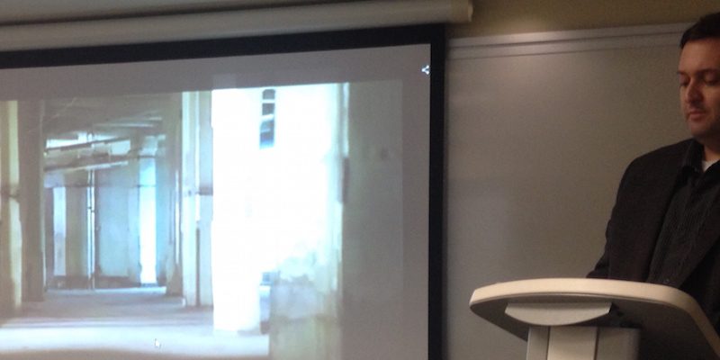 ceacccropped Cropped image of the podium and the screen where a material is being presented for the audience.