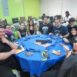 Students sitting on a table representing the Ravenclaw house from Happy Potter.