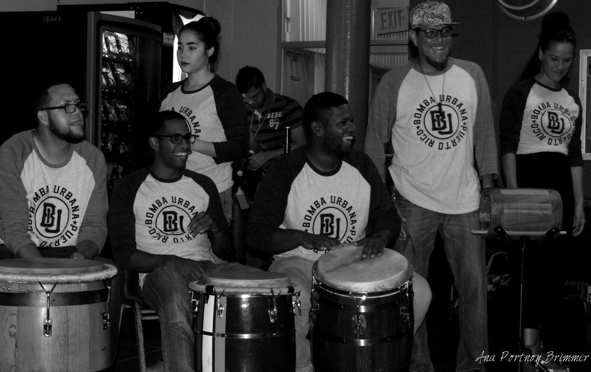 Black and white picture of two musicians playing the drunks.