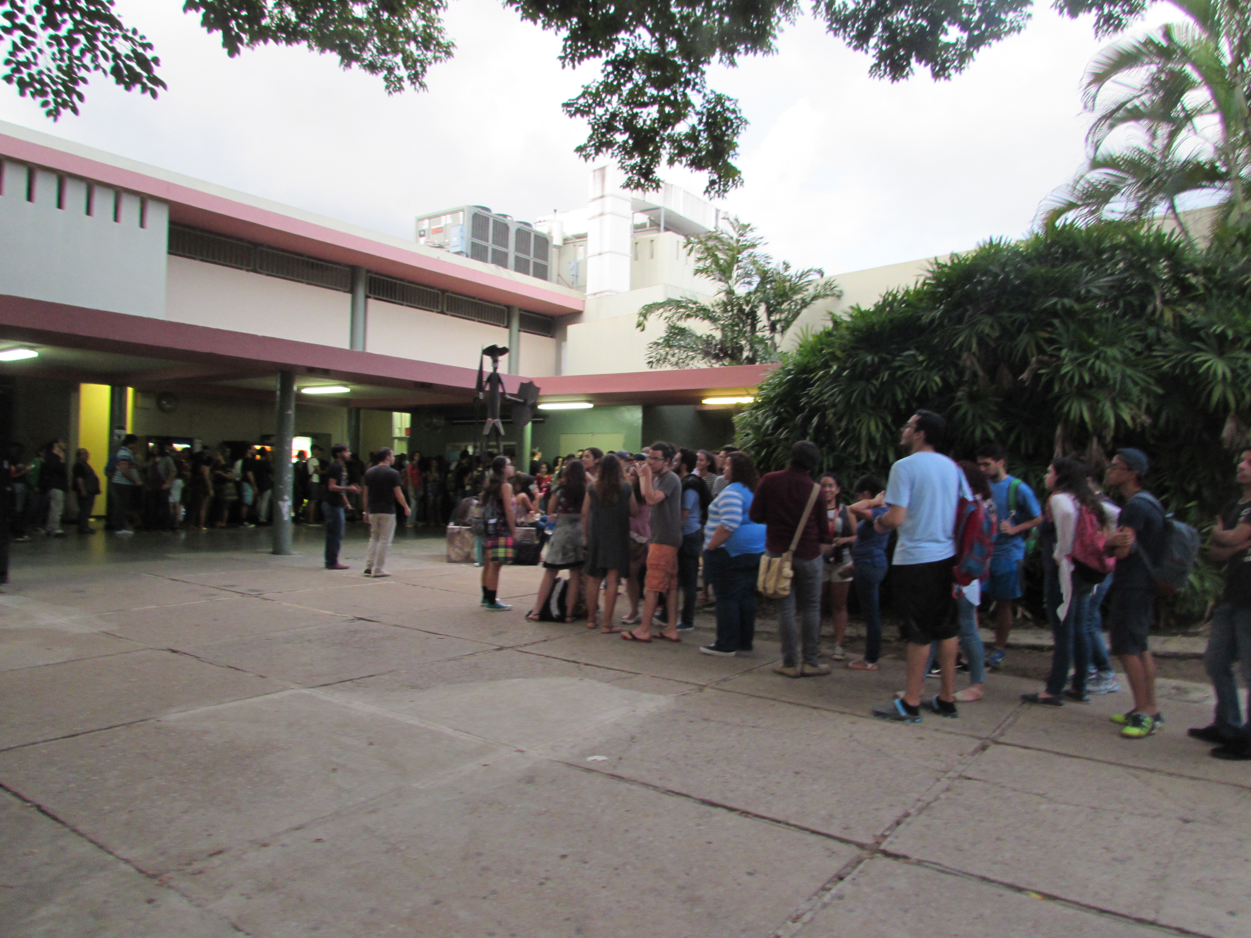 A panoramic shot of the Chardon Lobby where a lot of people can be seen interacting while waiting in line for the show.