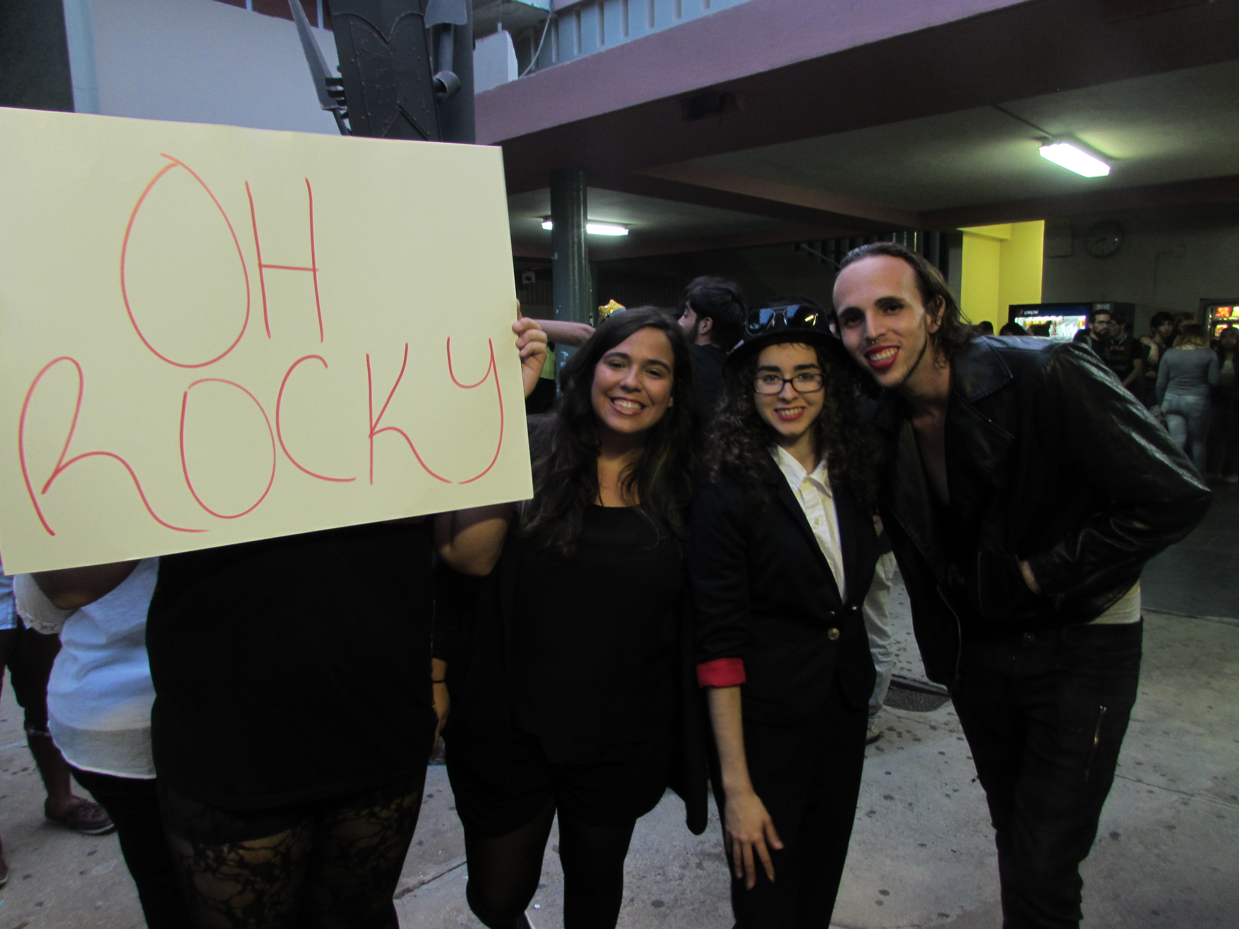 Some fans are posing next to some of the cast members holding up their very own hand made signs.