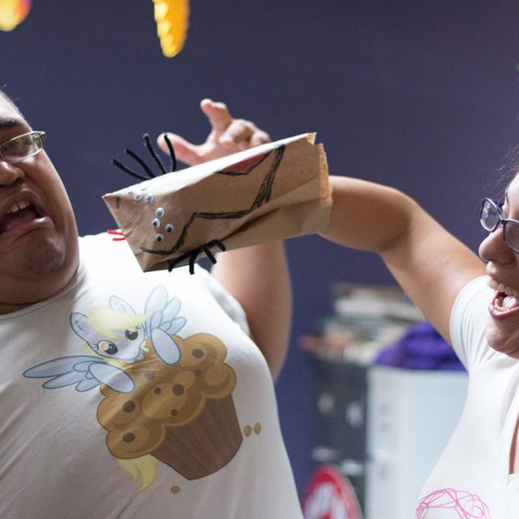 EDSA members playing with home made hand puppets.