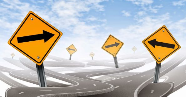 Stock image of arrow signs in a highway.