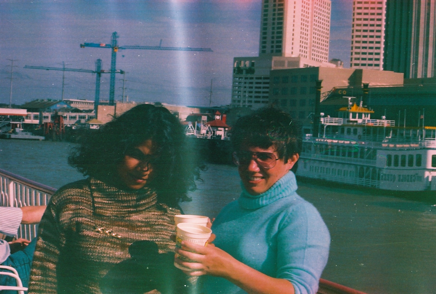 Liz Dayton with a girl friend with a drink, after MLA conference in New Orleans in 1988.