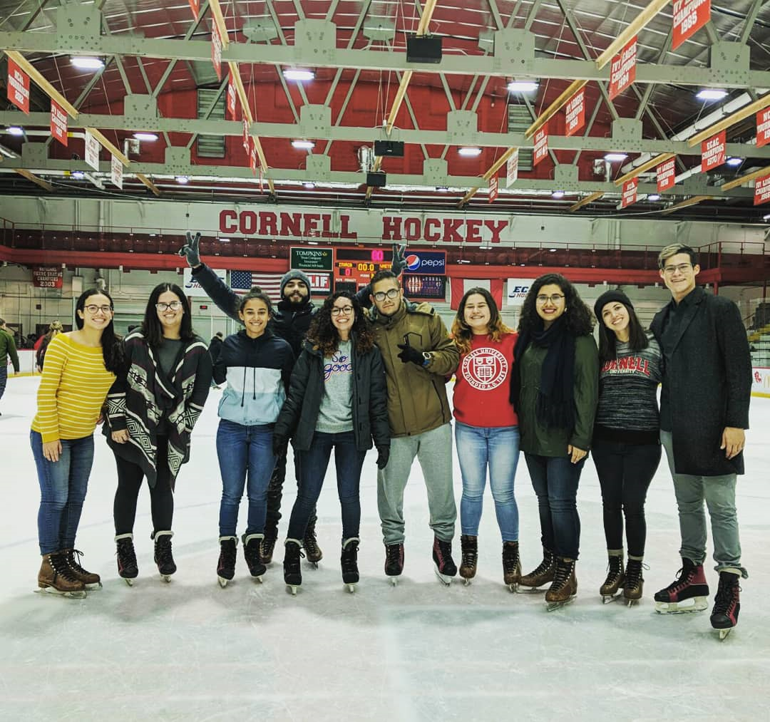 A group of students standing at the Cornell Hockey Rink