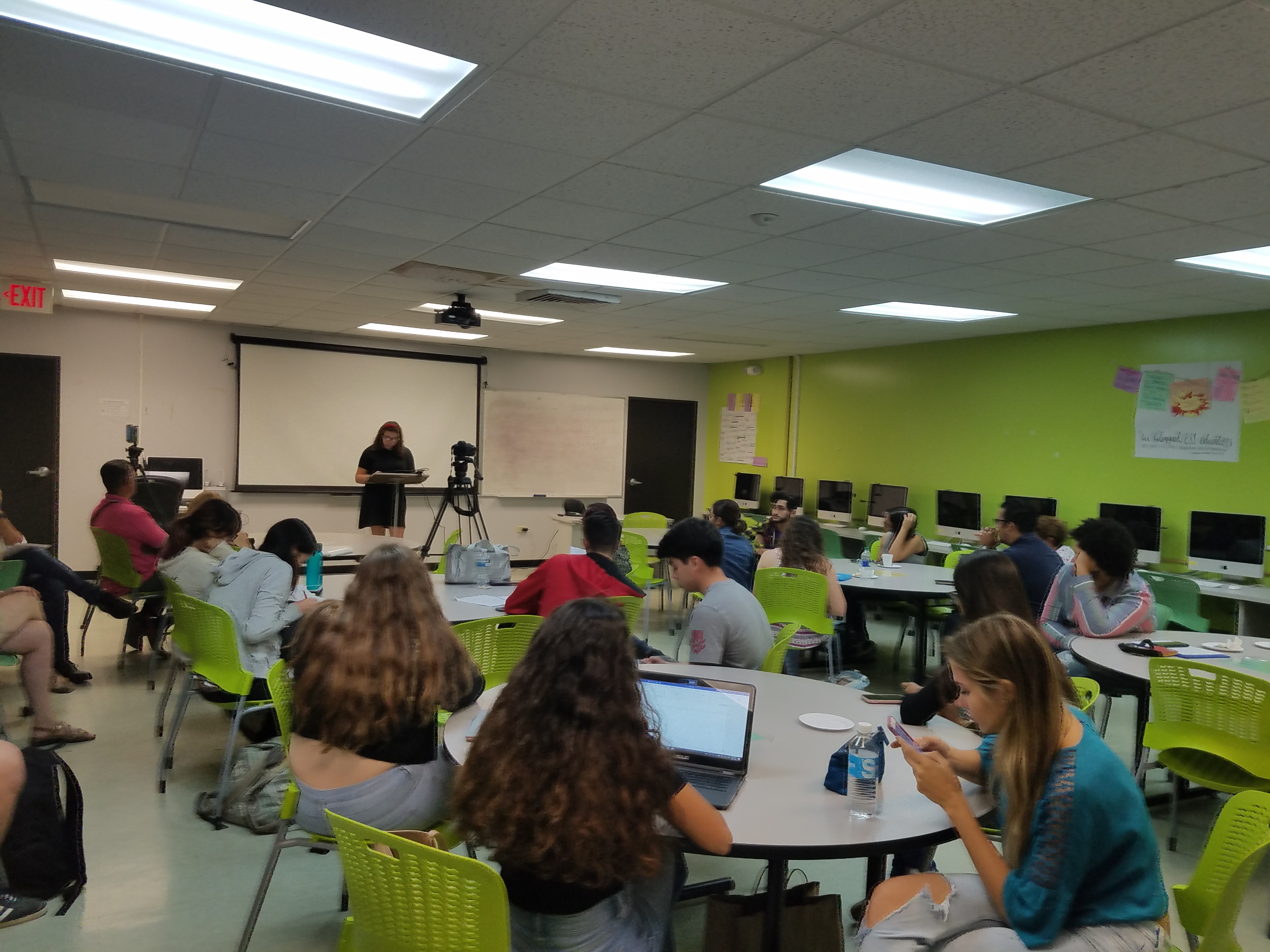 An English Department's student talking at the Hurricane Maria Entries and Research Presentations.