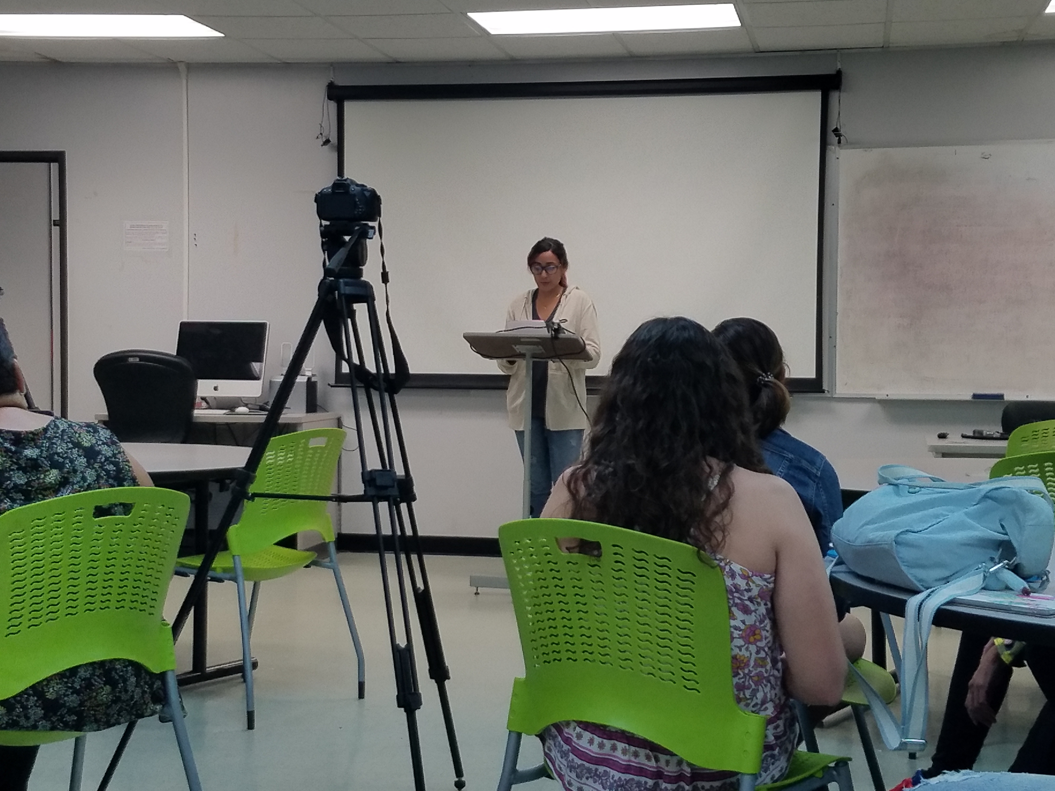 An English Department's student talking at the Hurricane Maria Entries and Research Presentations.