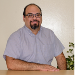 A picture containing person, person, wall, indoor
Description automatically generated