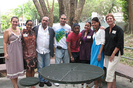 At each corner, from the lefthand side: event organizers, doctors Mary Sefranek and Judy Casey, accompanied by The Rebel Poets: Maisha Tulivu Fisher, Joseph Ubiles, Ramón De Jesús, Ronald Jay, Arline Hernández and Amanda Maisonet.