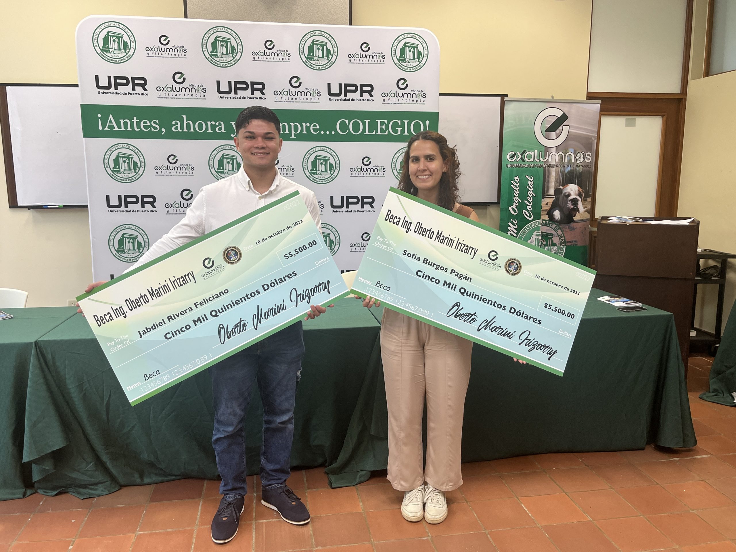Los estudiantes Sofía Alejandra Burgos Pagán y Jabdiel Rivera Feliciano del Departamento de Ingeniería Civil y Agrimensura del Recinto Universitario de Mayagüez, fueron los primeros dos recipientes de la Beca ingeniero Oberto E. Marini Irizarry, egresado de la clase de 1972 del mencionado Departamento. Prensa RUM Desde la izquierda los estudiantes Jabdiel Rivera Feliciano y Sofía Alejandra Burgos Pagán, quienes ueron los primeros dos recipientes de la Beca ingeniero Oberto E. Marini Irizarry.