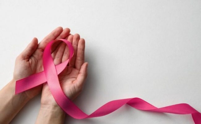 Portada Marcha Rosada Lazo rosado emblemático de prevención de cáncer de seno