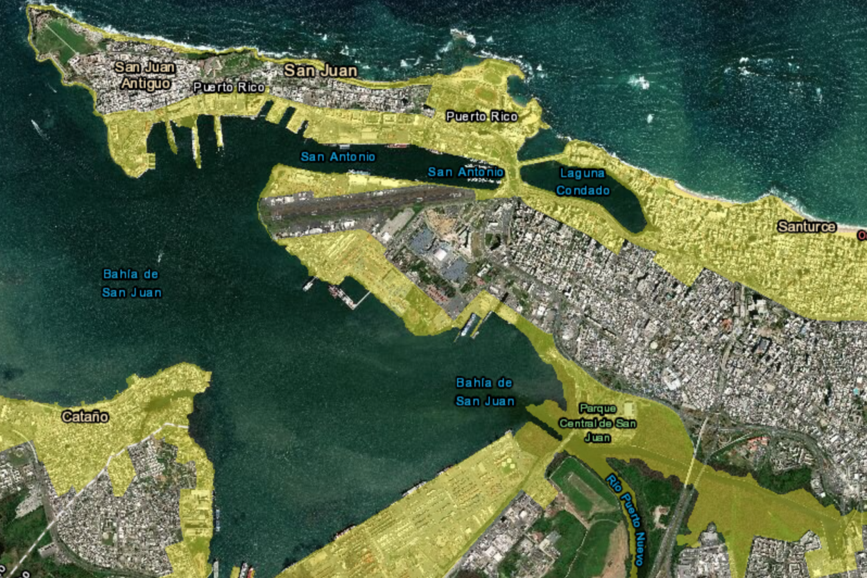 This is a screenshot of a satellite image of San Juan with areas along the coast shaded in yellow.